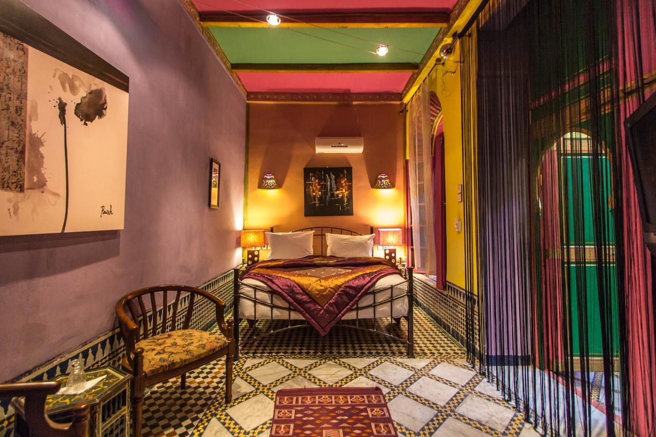 Riad Haj Palace & Spa Fès Exteriér fotografie A bedroom at the hotel